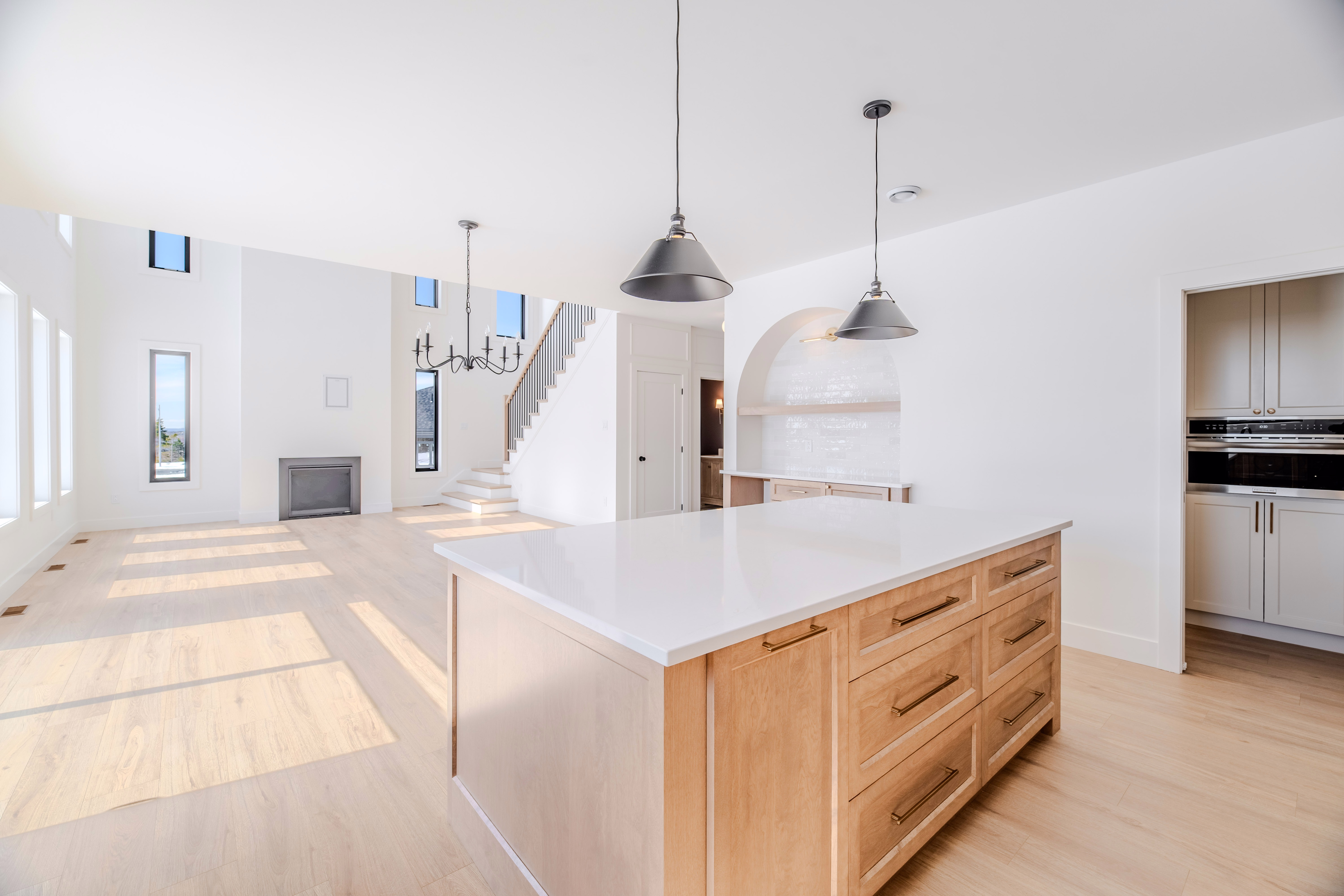 The Tuckamore — Kitchen island and living room
