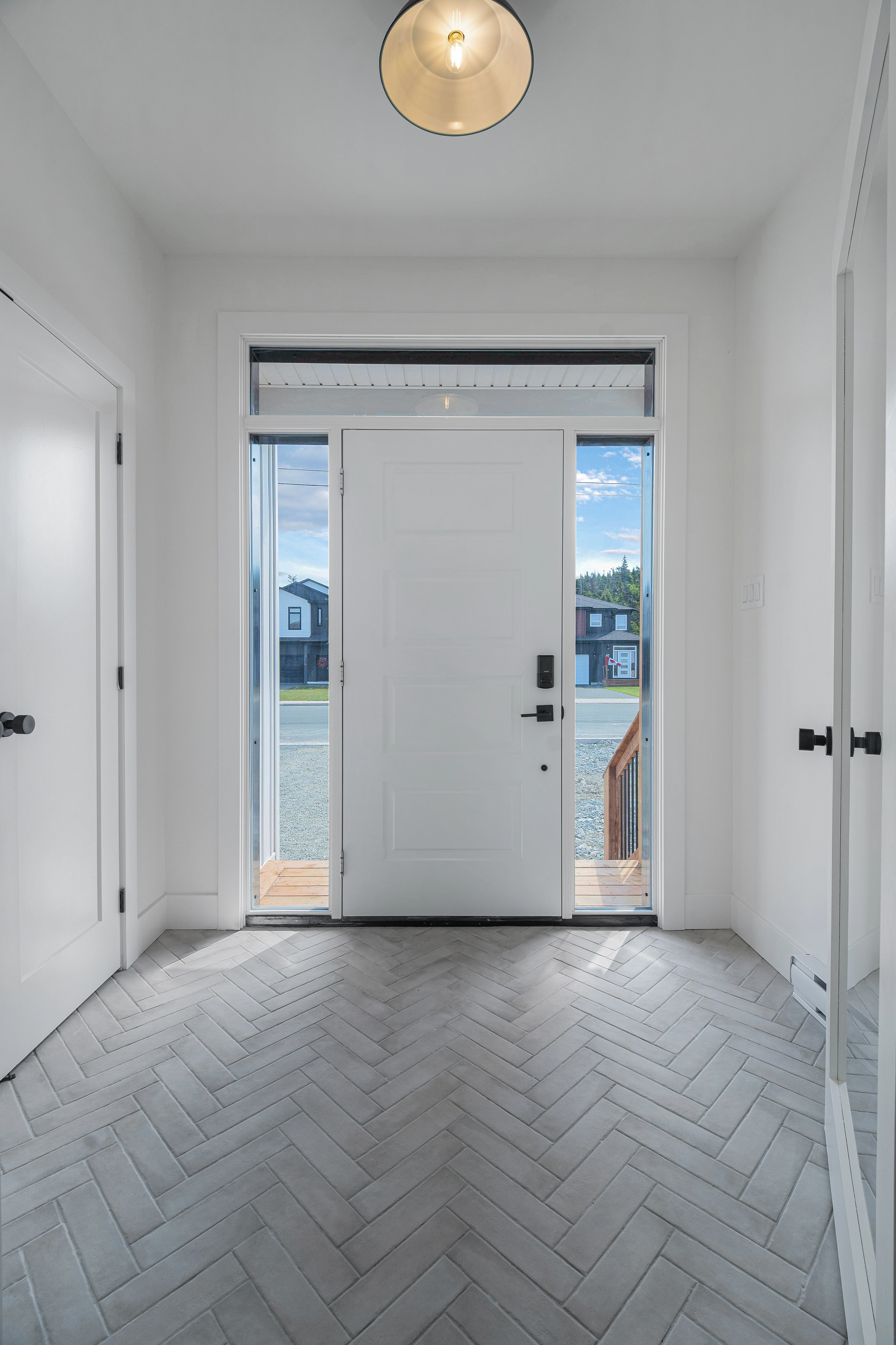 Saltwater House — Tiled entrance and front door
