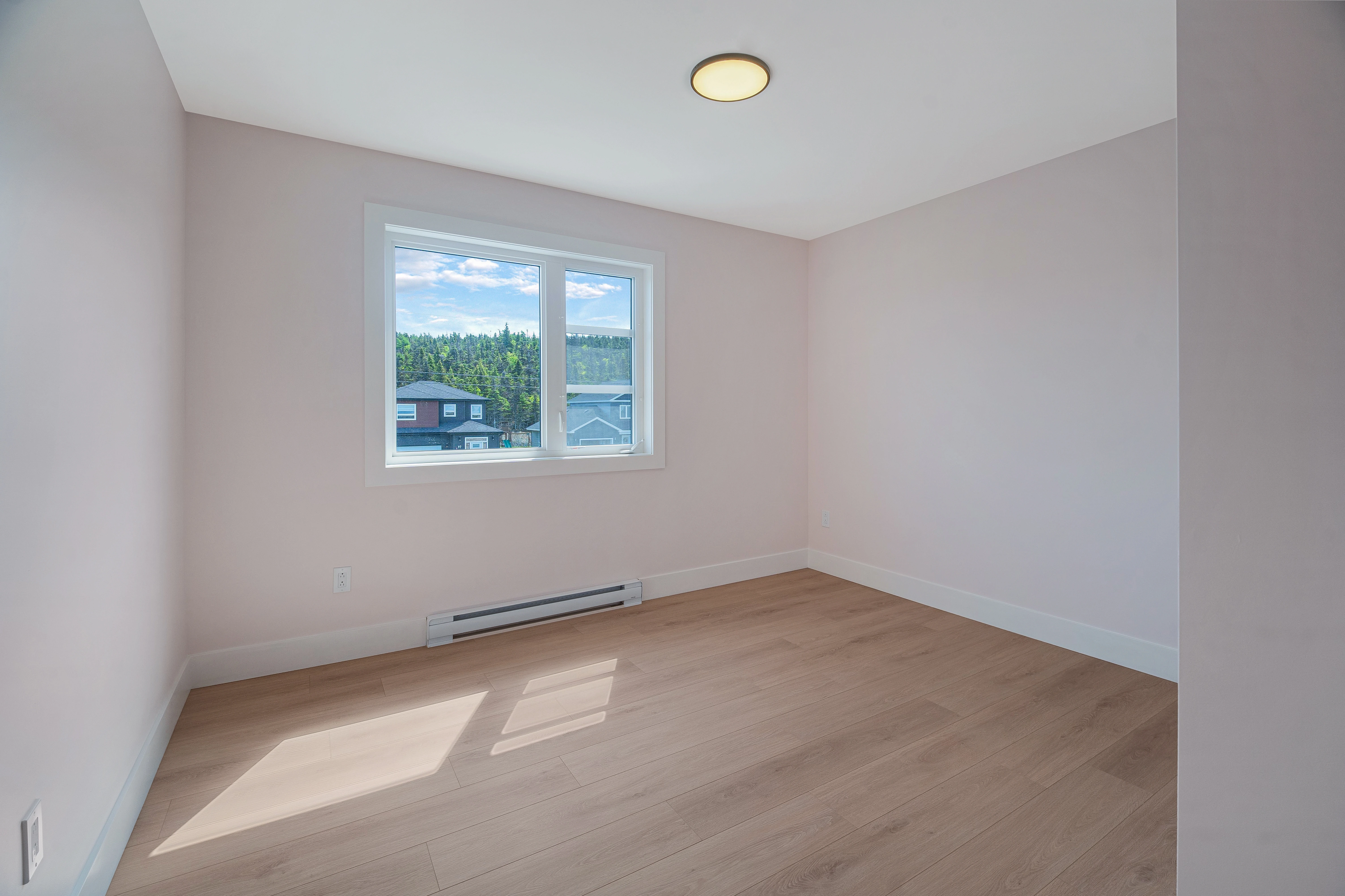 Saltwater House — Second bedroom and window light