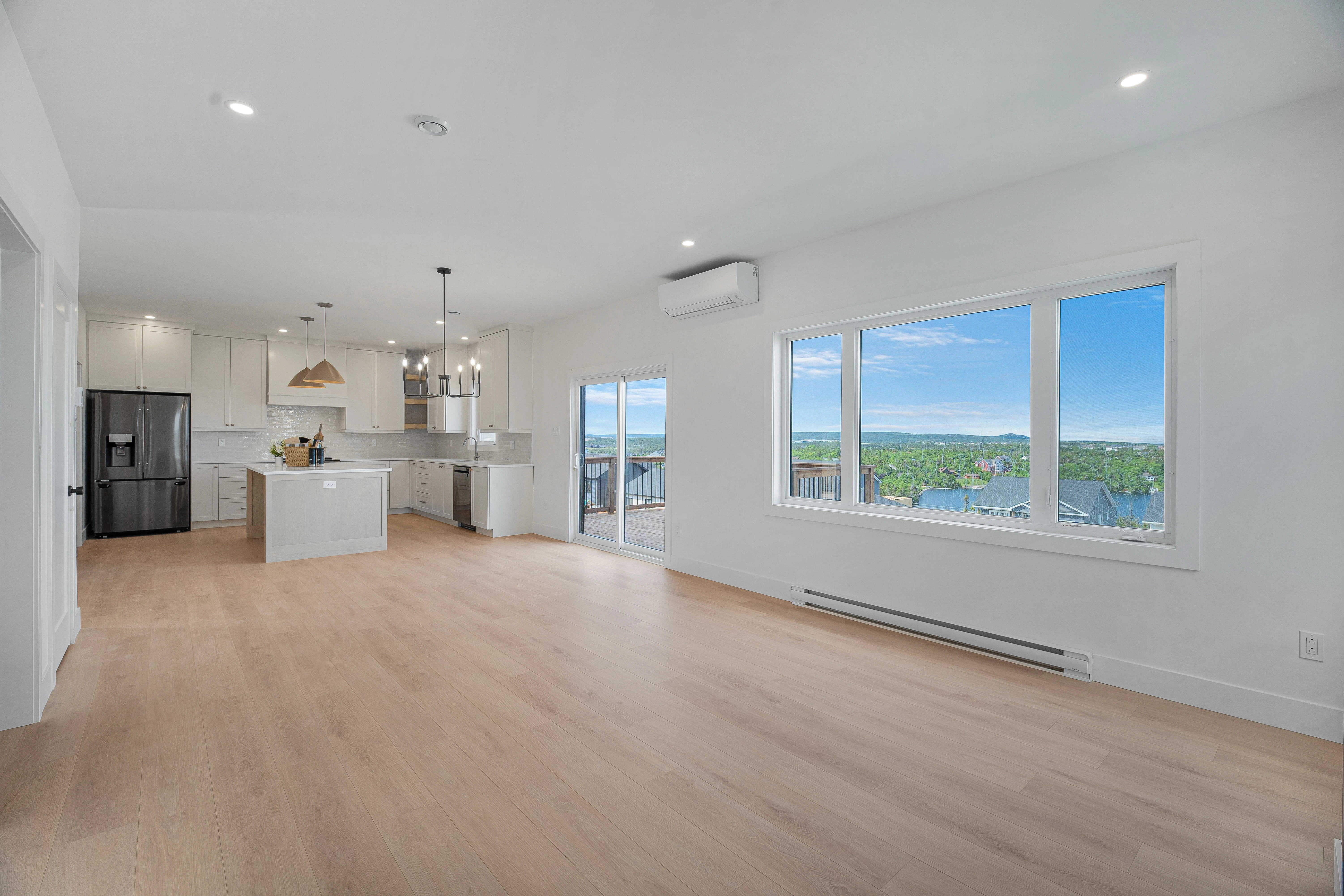 Saltwater House — Open living area and garden doors