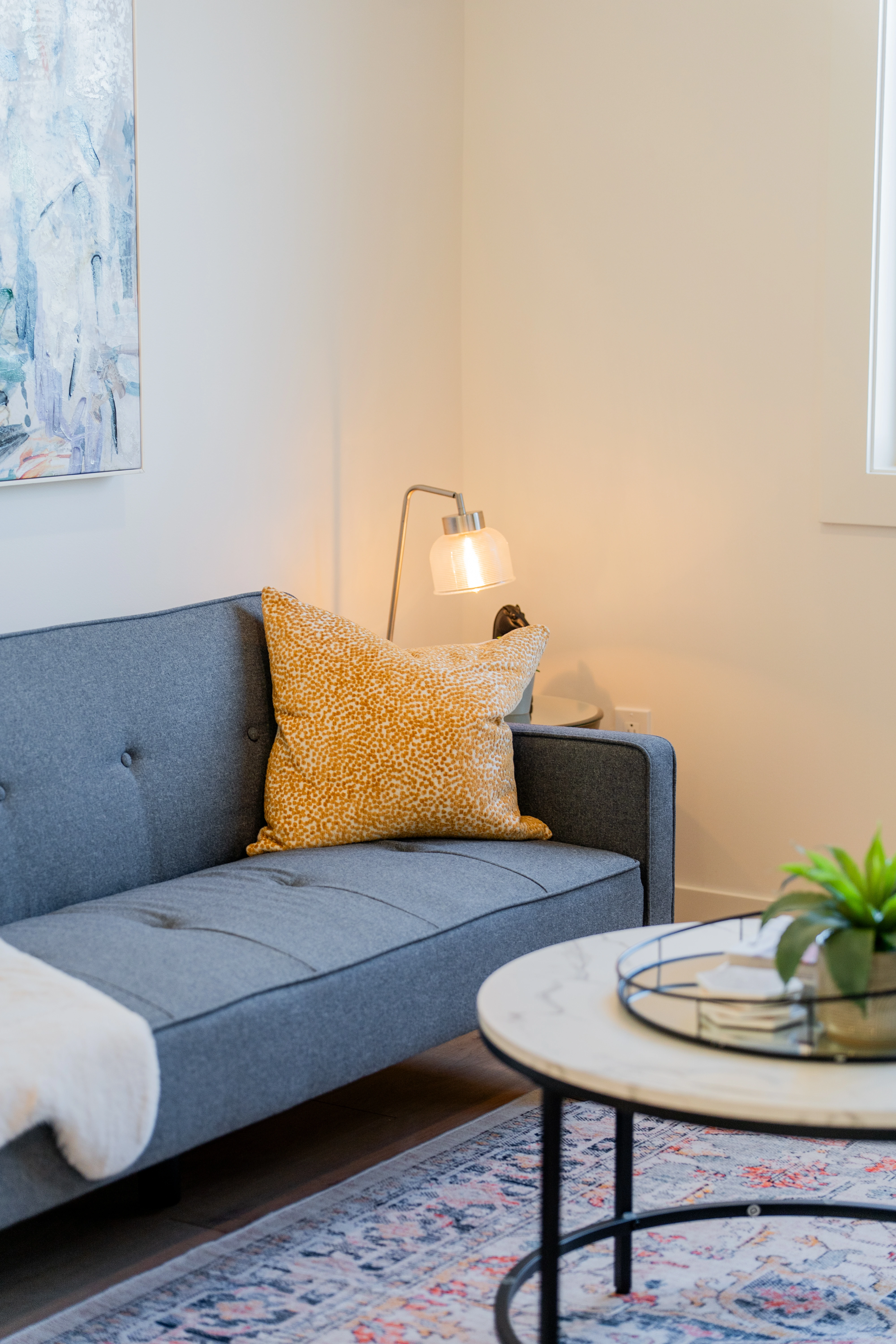 The Bakeapple — Living room sofa and window light