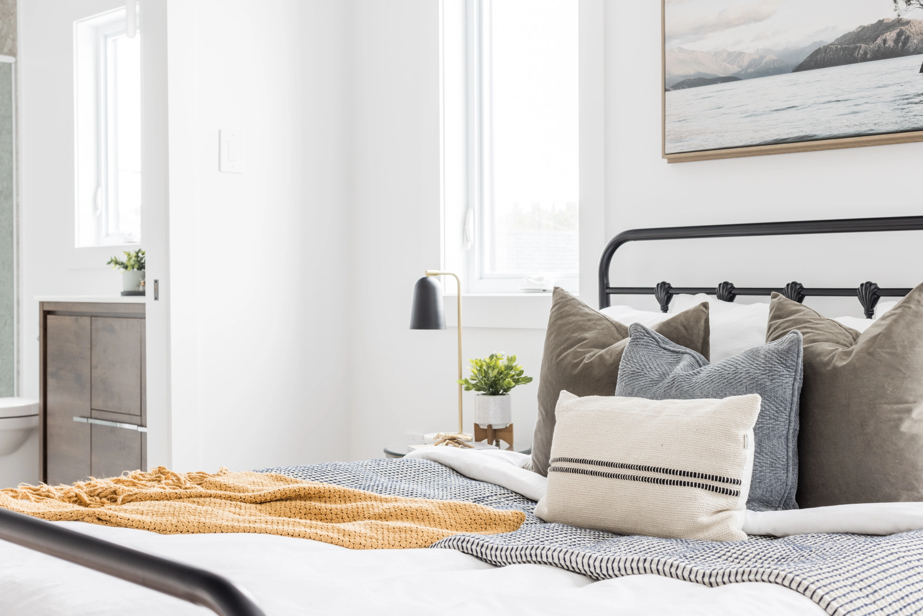The East Coast — Bedroom with layered textiles