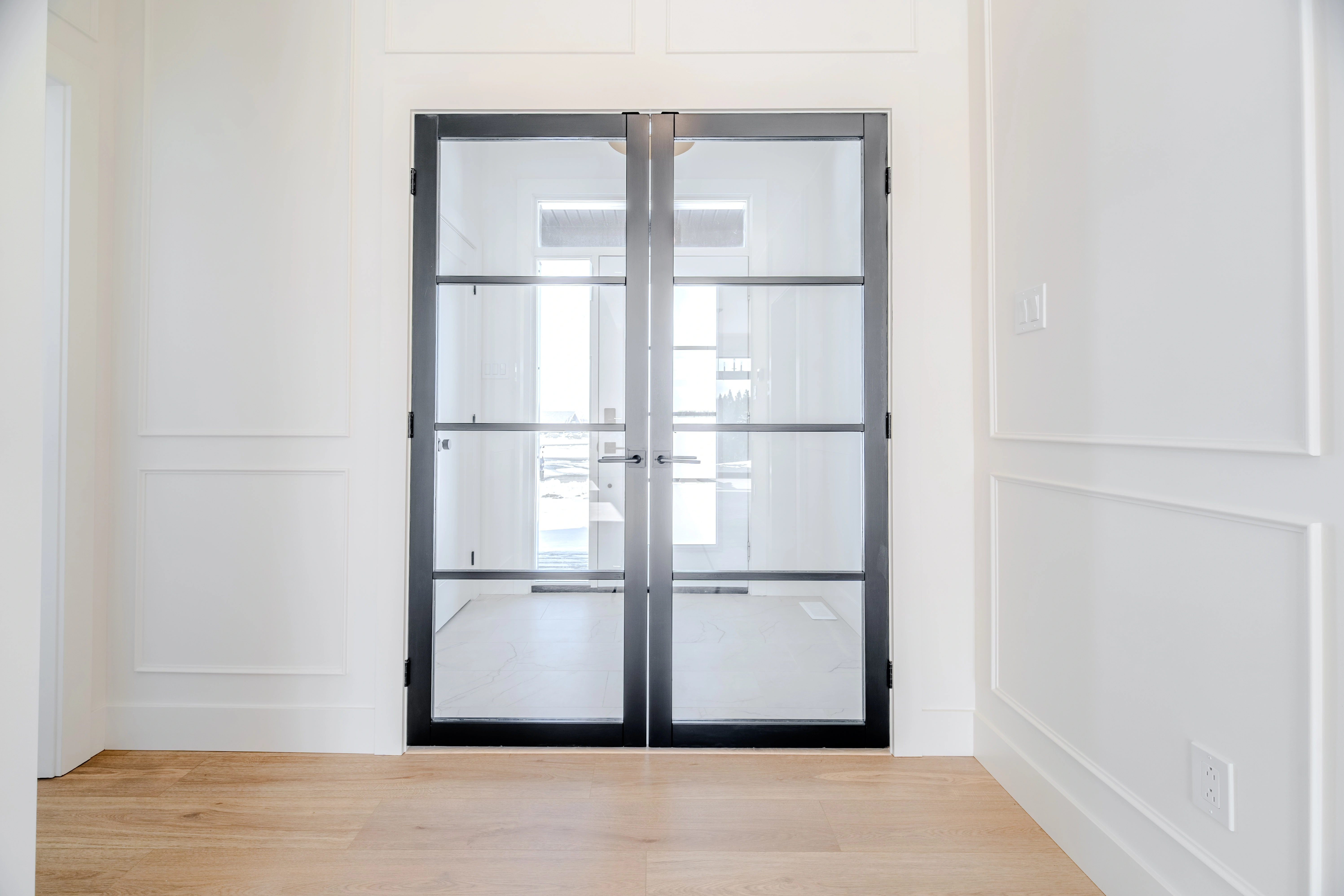 The Tuckamore — Glazed interior doors and hallway