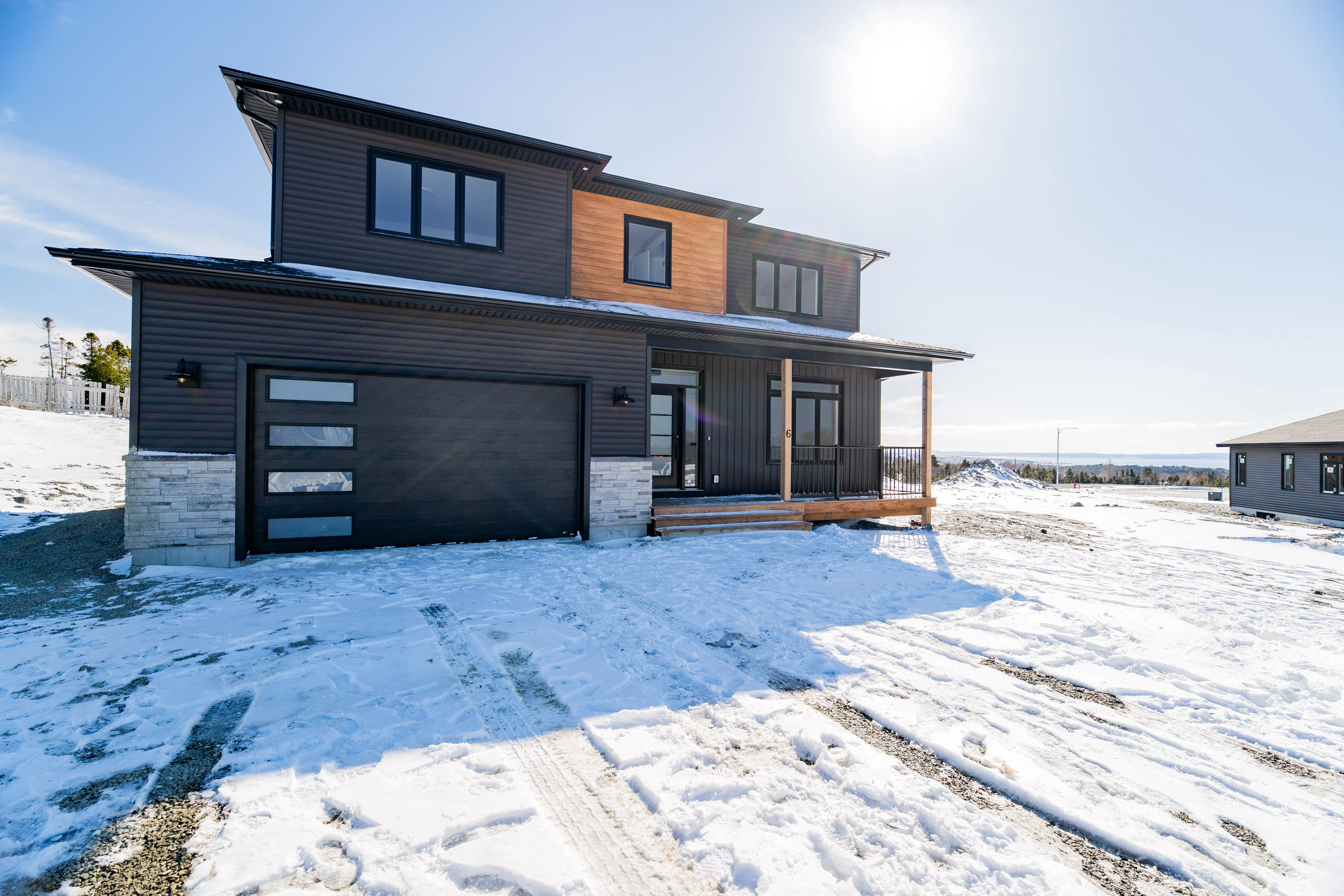 The Tuckamore — Front entrance and exterior materials